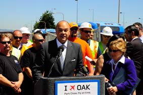 Port of Oakland Executive Director Omar R. Benjamin speaking at an Oakland International Airport press conference with U.S. Senator Barbara Boxer to urge Congress to provide a speedy and long-term resolution to the FAA crisis.